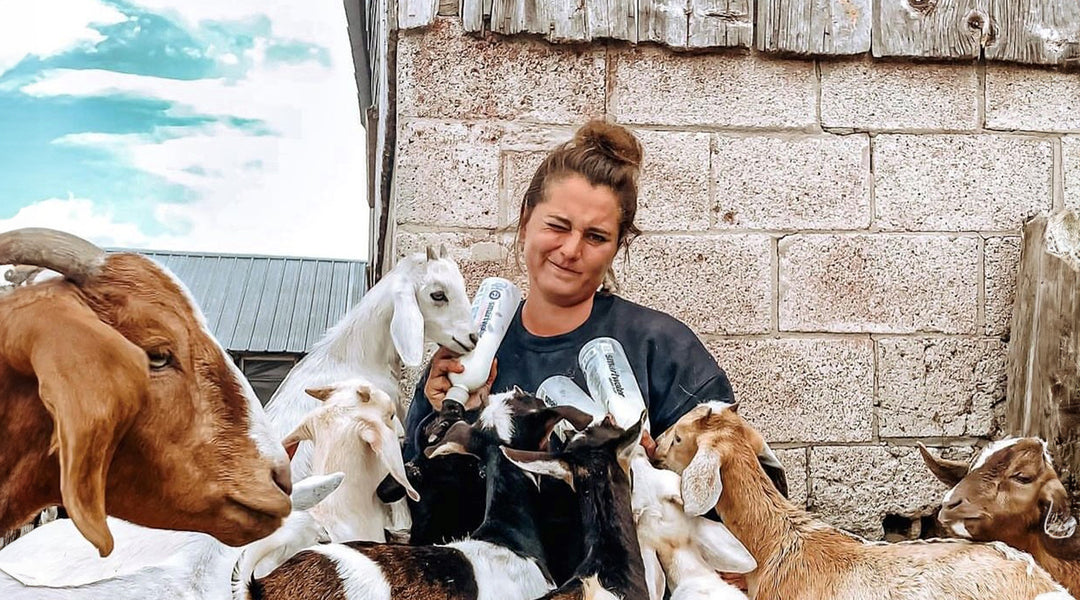 Elizabeth Taffet with goats